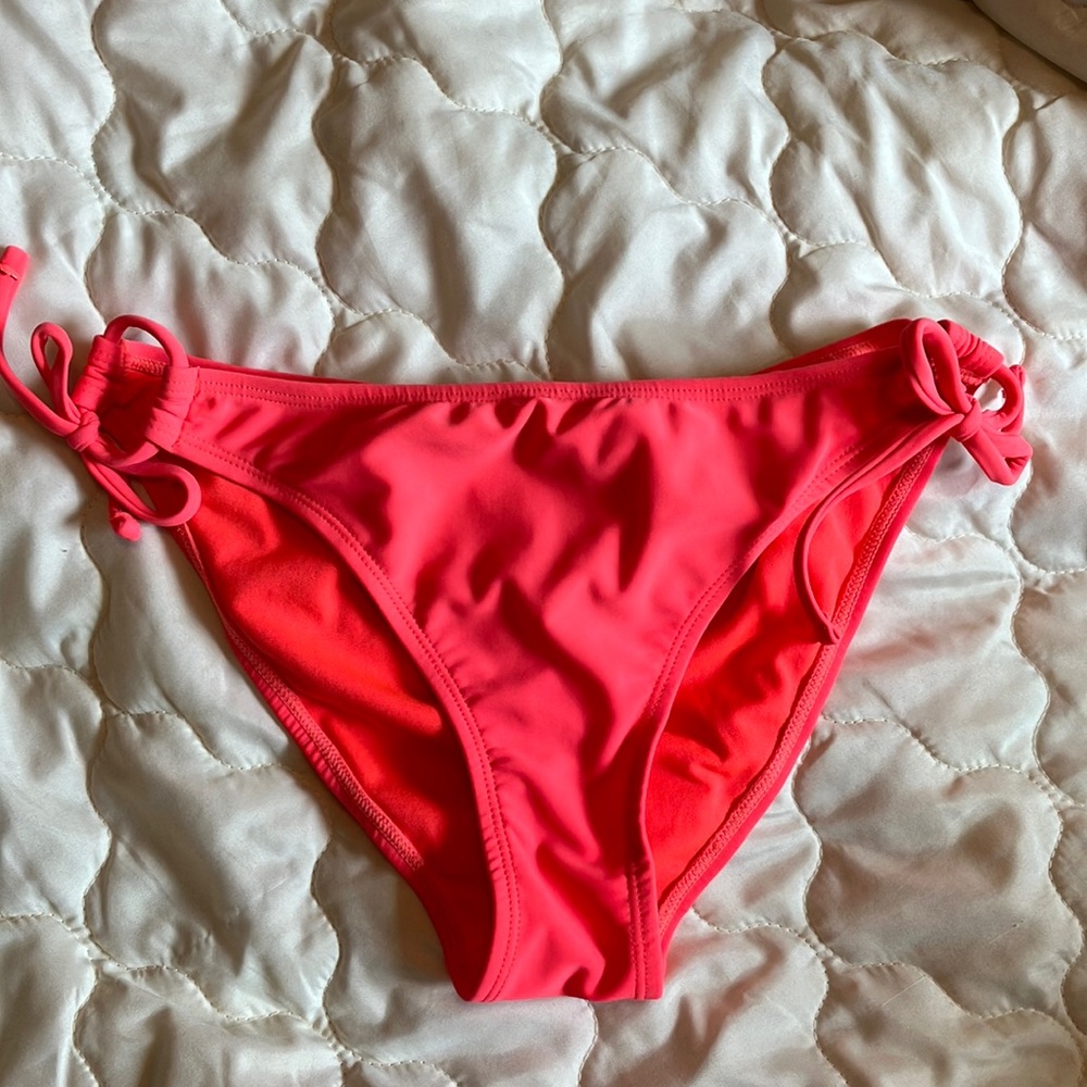 So pretty hot coral color bikini bottom by California Waves, size medium!